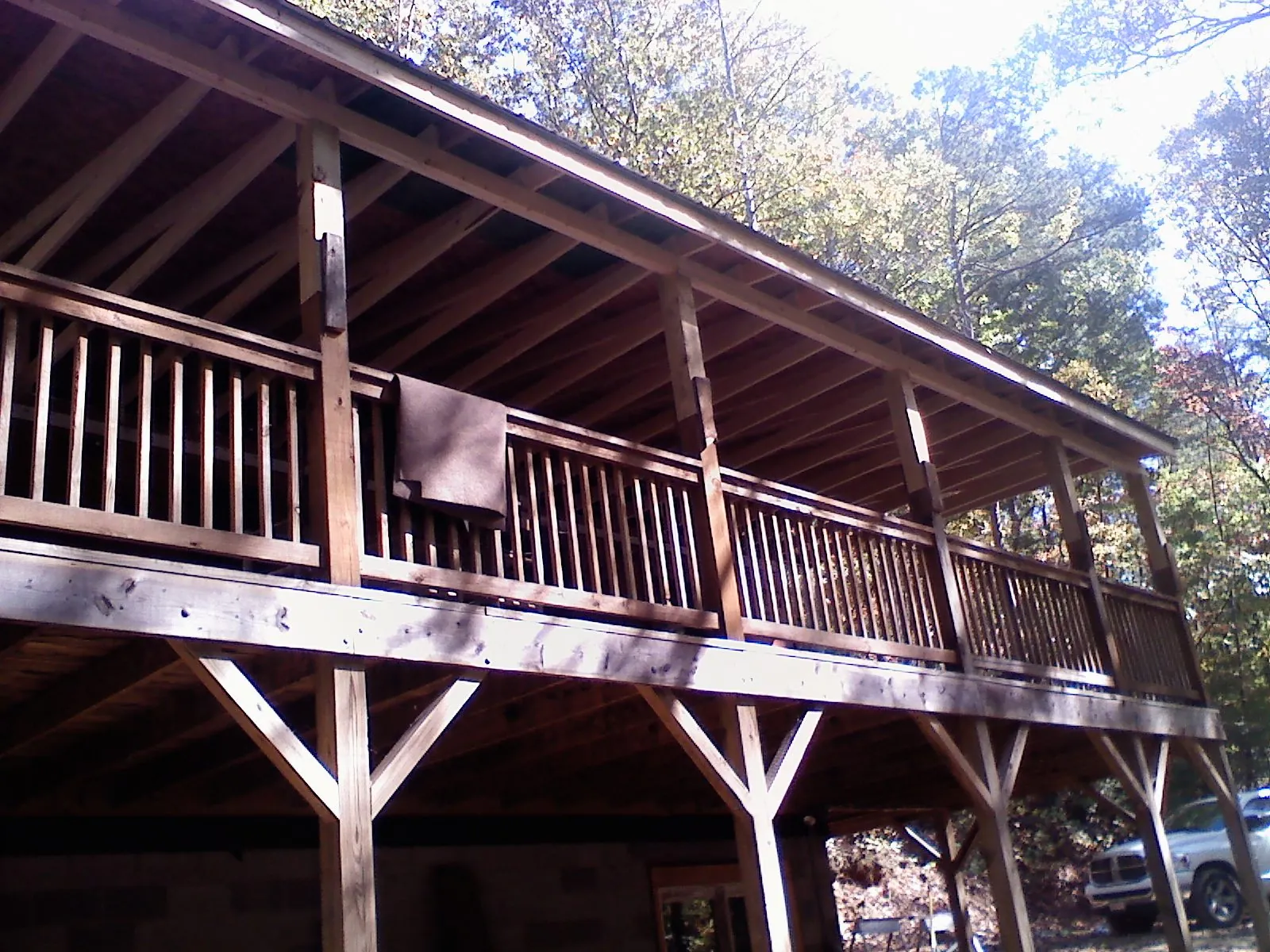 Timber framing under a new elevated porch and deck — Roof Leak Repair in Wallisville by Roofing Brothers